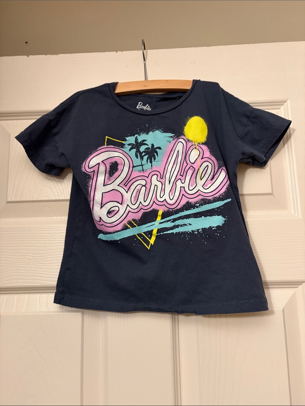 Barbie Navy Short Sleeve Tee with Pink Logo and Pastel Accents